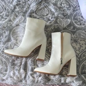 White heeled booties